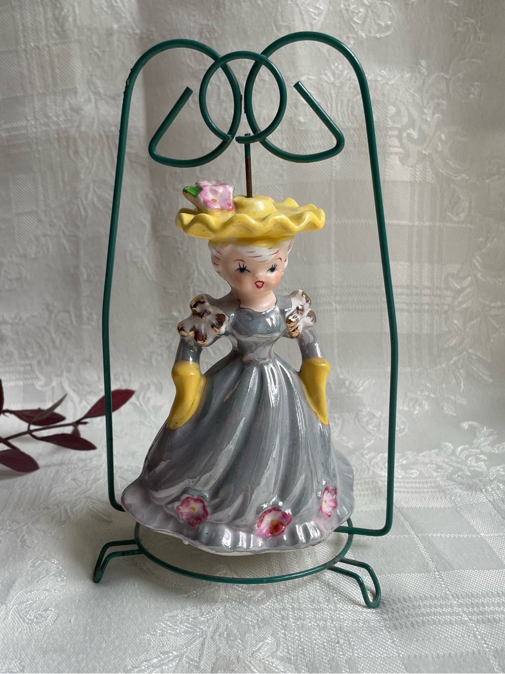 Vintage Spinning Porcelain Figure on Metal Stand